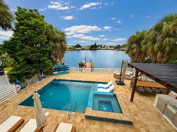 New Waterfront • Heated Pool & Spa • Walk to Beach - Image 1